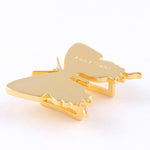 Butterfly sneaker pendant finished in yellow gold