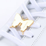 Butterfly sneaker pendant finished in yellow gold
