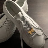 Butterfly sneaker pendant finished in yellow gold