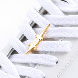Crocodile sneaker pendant finished in yellow gold