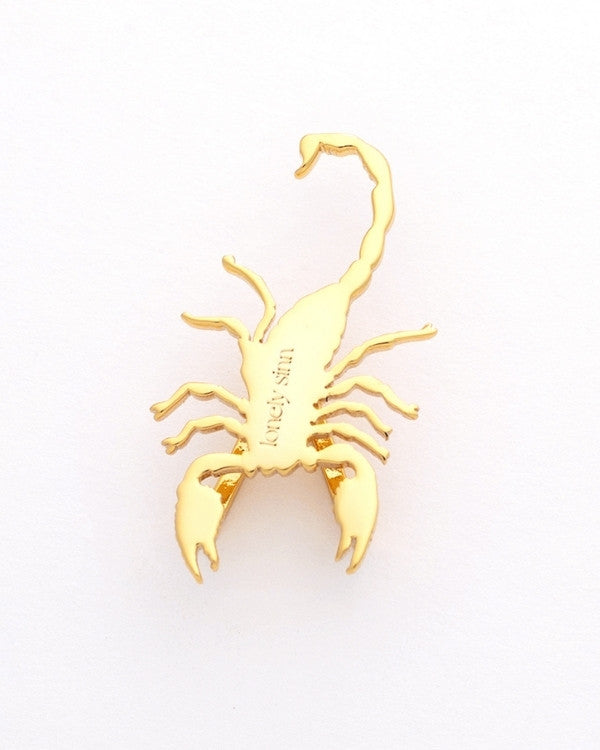 Scorpion sneaker pendant finished in yellow gold